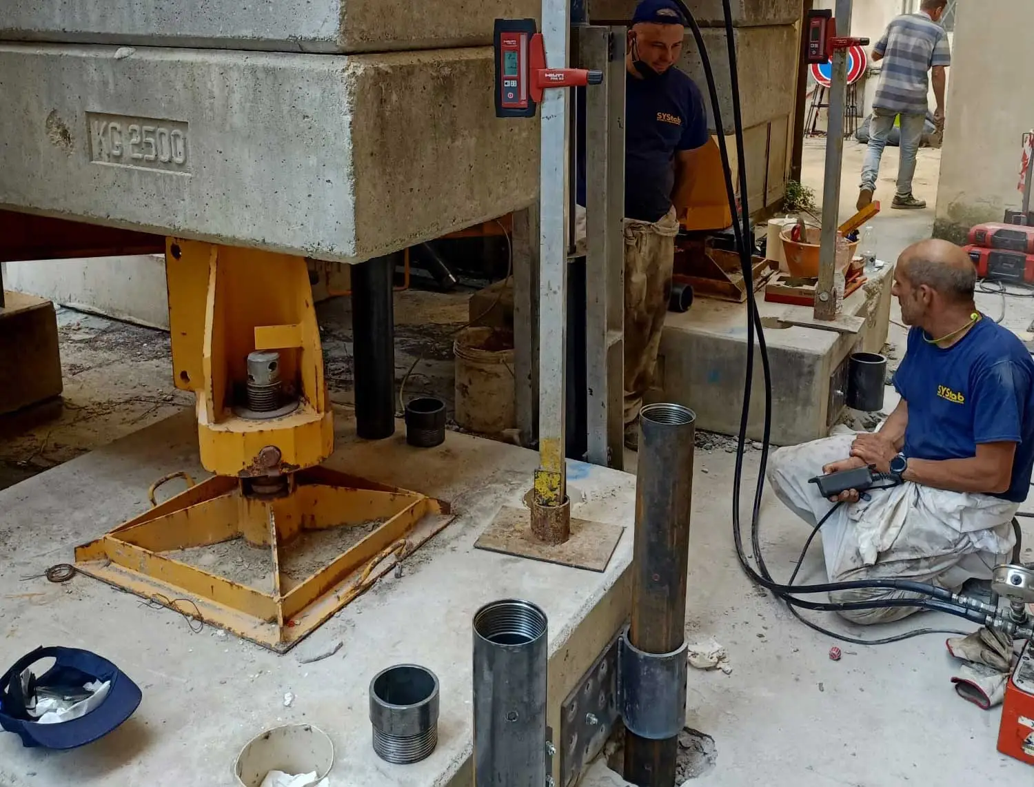 Foundation consolidation, how to stabilize a crane on compressible soil: a concrete case